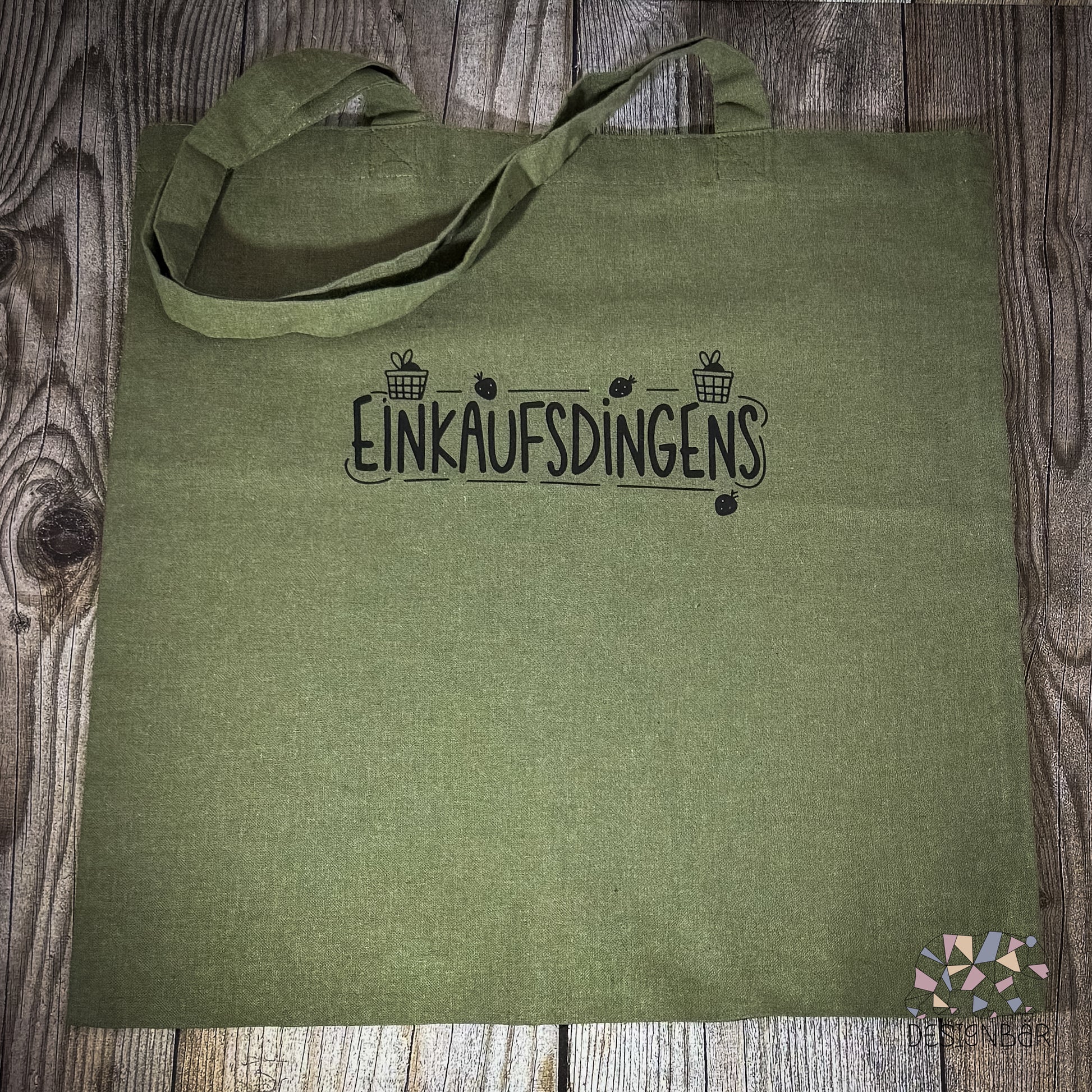 Olivgrüner Jutebeutel mit Aufdruck „Einkaufsdingens" von Designbär