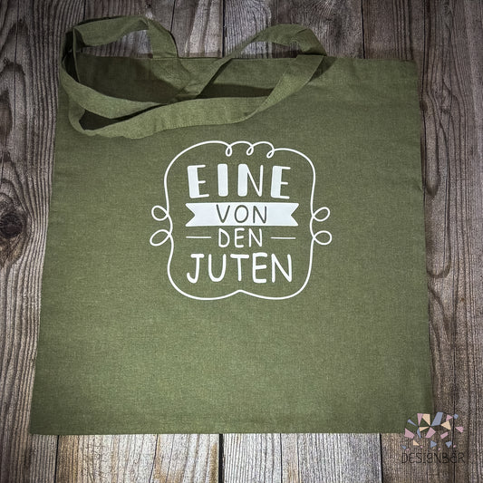 Olivgrüner Jutebeutel mit Aufdruck „Eine von den Juten" von Designbär