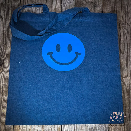 Blauer Jutebeutel mit Smiley-Aufdruck von Designbär